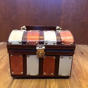 Leather wrapped trunk purse